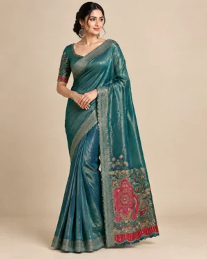 Embroidered satin saree with matching blouse piece shown in cream, teal, and orange-red colourways.